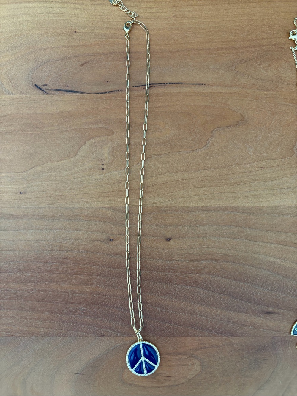 Gold-Tone Necklace with Blue Peace Sign Pendant-purchased @ Hanavenezia